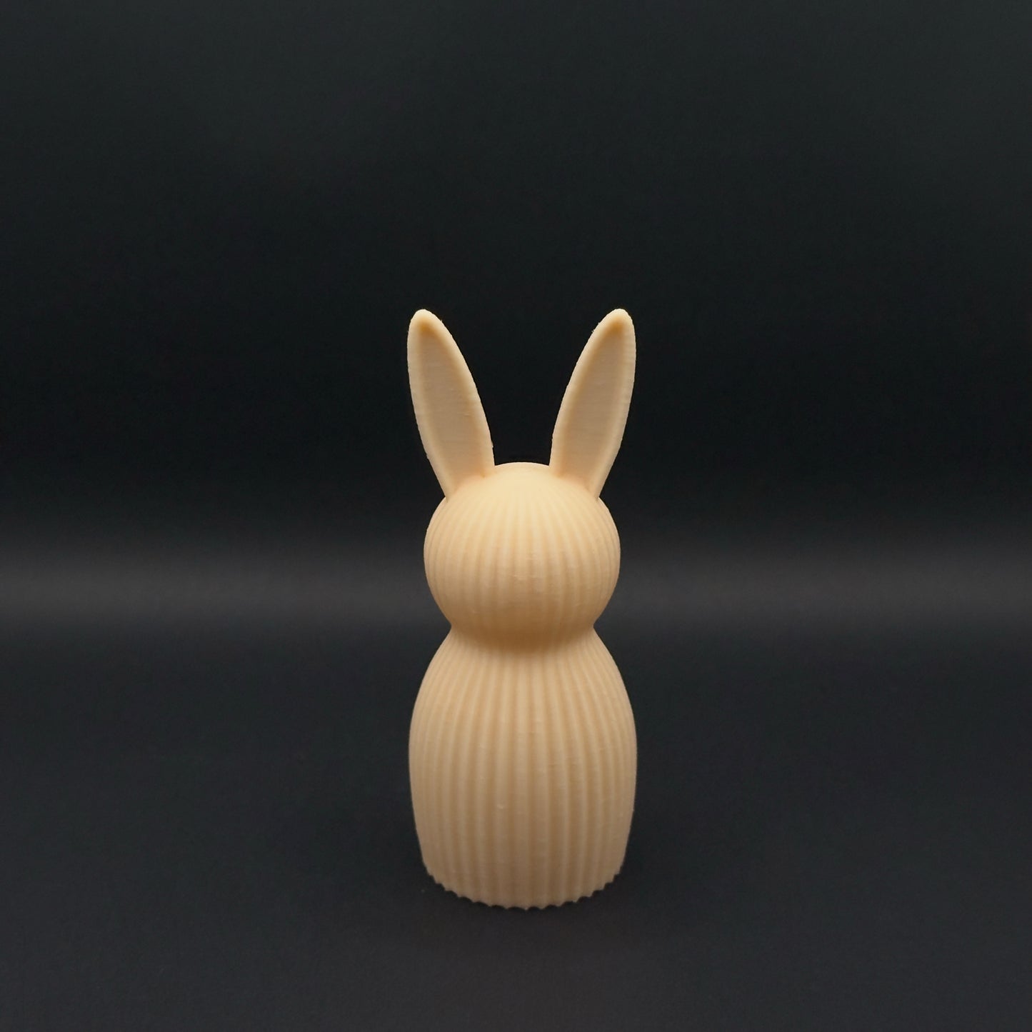 Osterhase Nordic by MX³ Design, a medium-sized decorative Easter bunny in a salmon color.