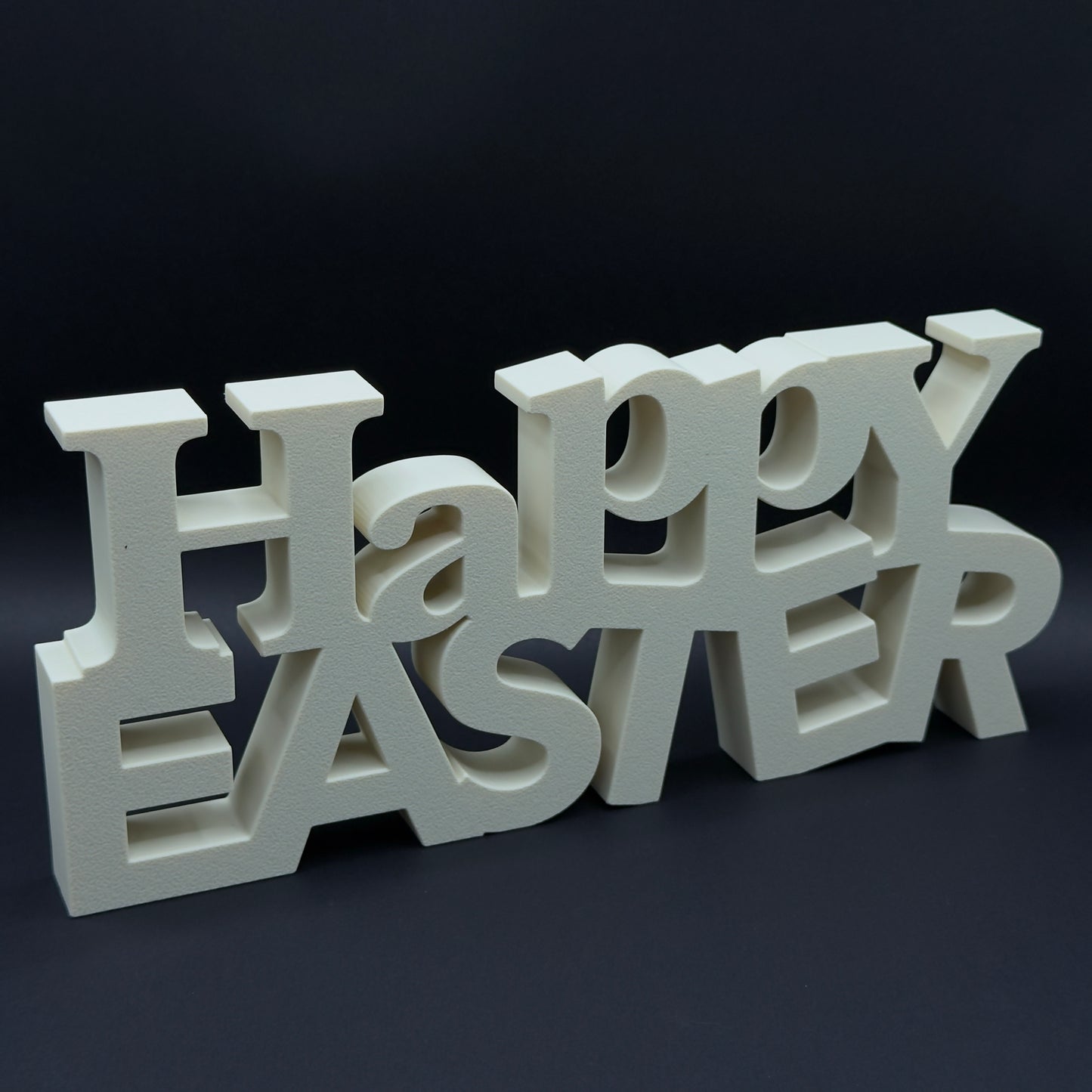 Colorful "Happy Easter" design by MX³ Design featuring festive eggs and spring flowers in a cheerful layout.