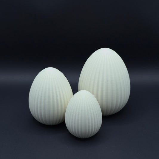 MX³ Design Osterei Nordic in bone white, featuring a smooth, glossy finish and modern egg-shaped design.