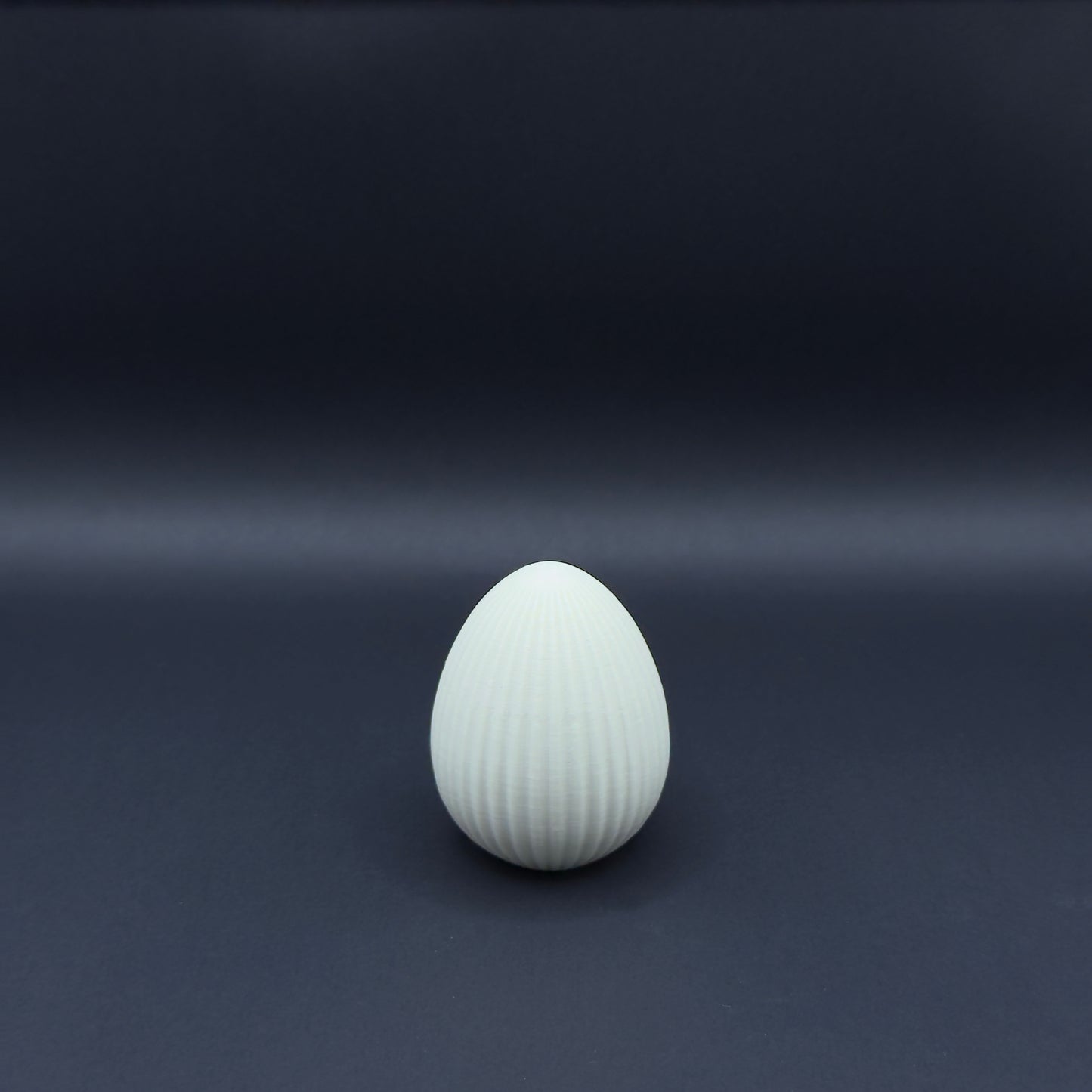 Small bone white Osterei by MX³ Design, featuring a smooth, minimalist design perfect for Easter decor.