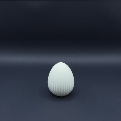 Small bone white Osterei by MX³ Design, featuring a smooth, minimalist design perfect for Easter decor.
