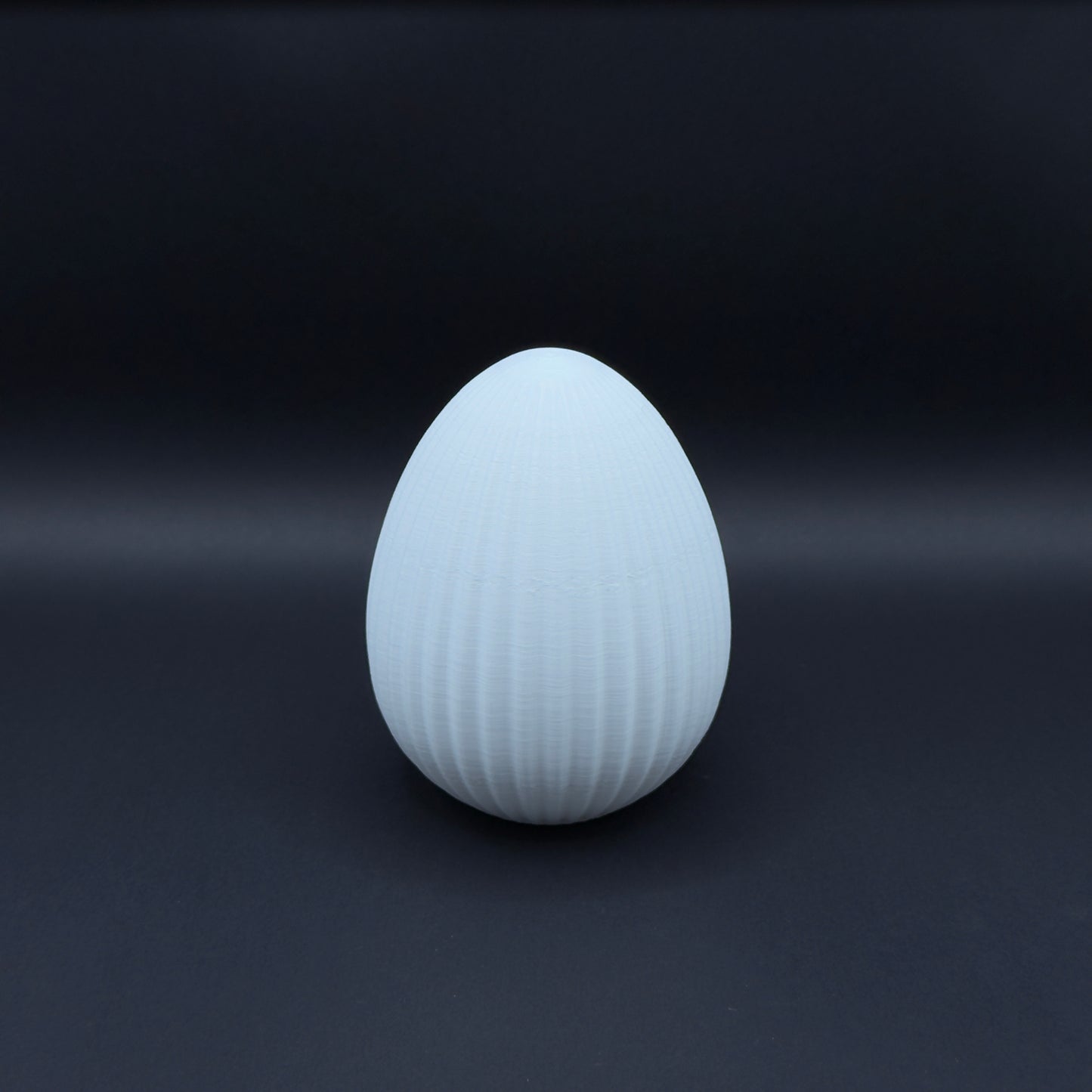 White Osterei Nordic decorative egg by MX³ Design, showcasing a smooth surface and elegant, minimalist design.