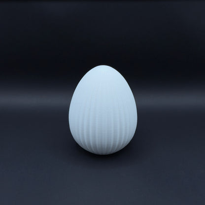 White Osterei Nordic decorative egg by MX³ Design, showcasing a smooth surface and elegant, minimalist design.