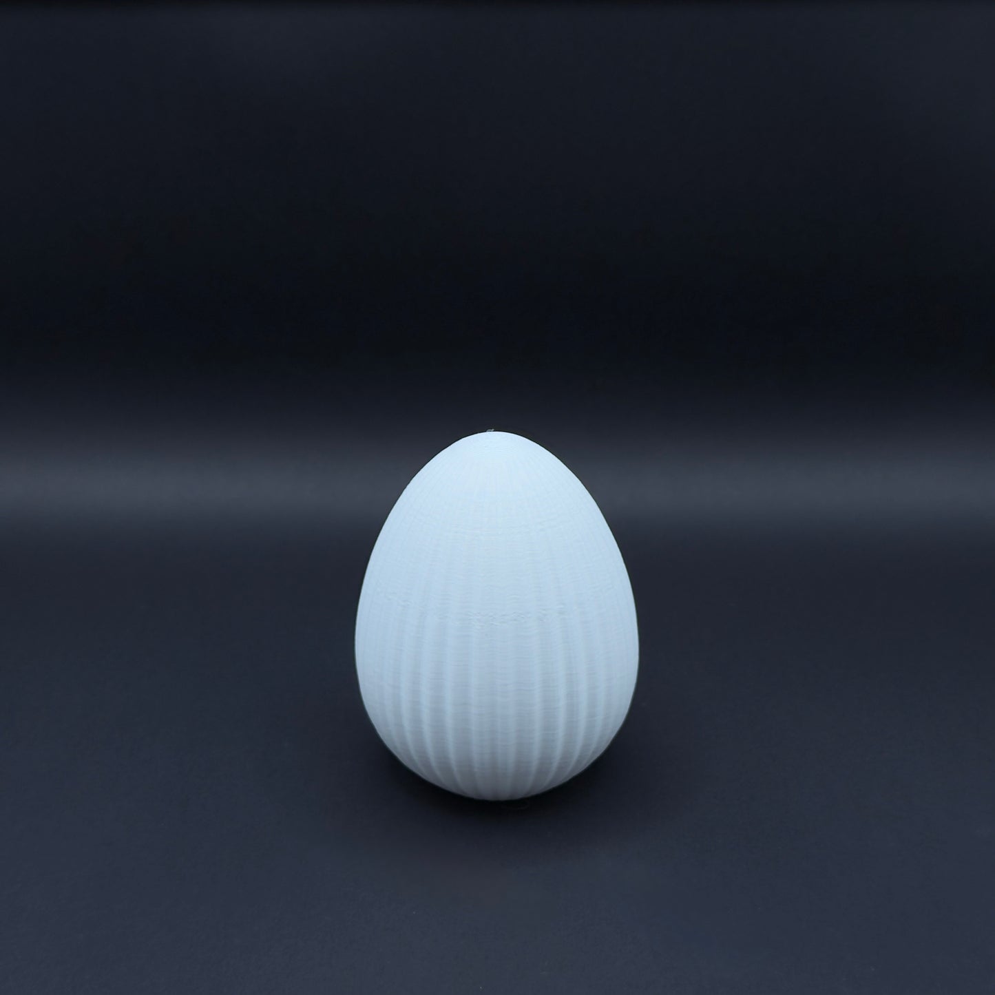 White Osterei Nordic egg by MX³ Design, featuring a smooth surface and elegant design, perfect for Easter decorations.
