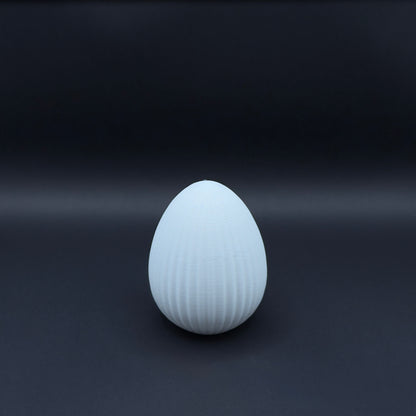 White Osterei Nordic egg by MX³ Design, featuring a smooth surface and elegant design, perfect for Easter decorations.