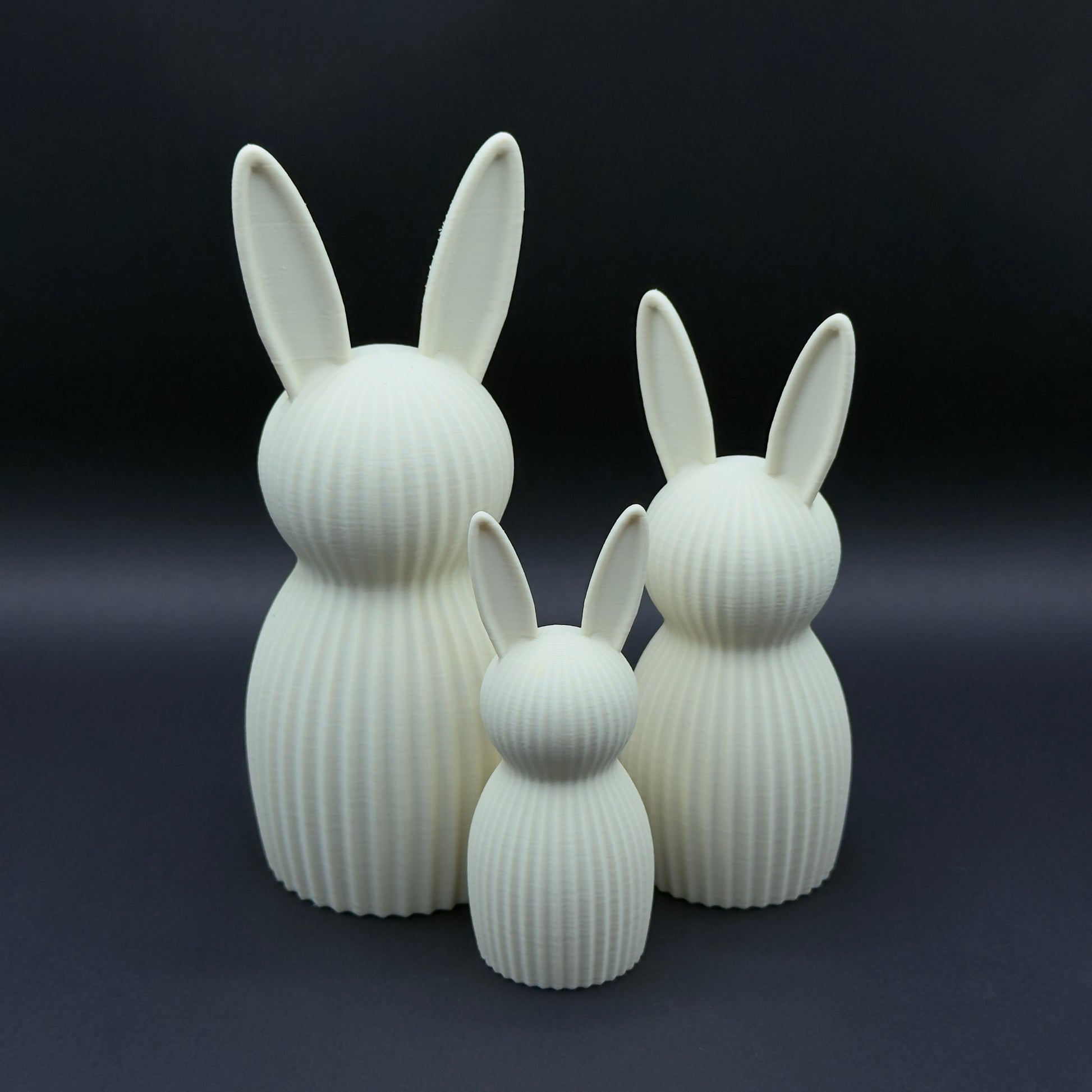 Osterhase Nordic in bone white by MX³ Design, showcasing a minimalist rabbit sculpture with smooth, sleek lines.