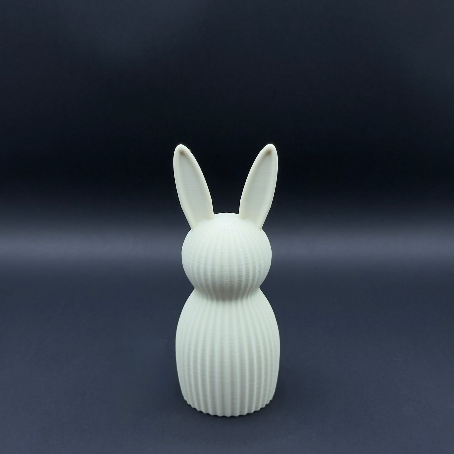 Osterhase Nordic by MX³ Design, medium-sized, bone white decorative Easter rabbit with minimalist design.