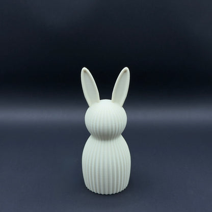 Osterhase Nordic by MX³ Design, medium-sized, bone white decorative Easter rabbit with minimalist design.